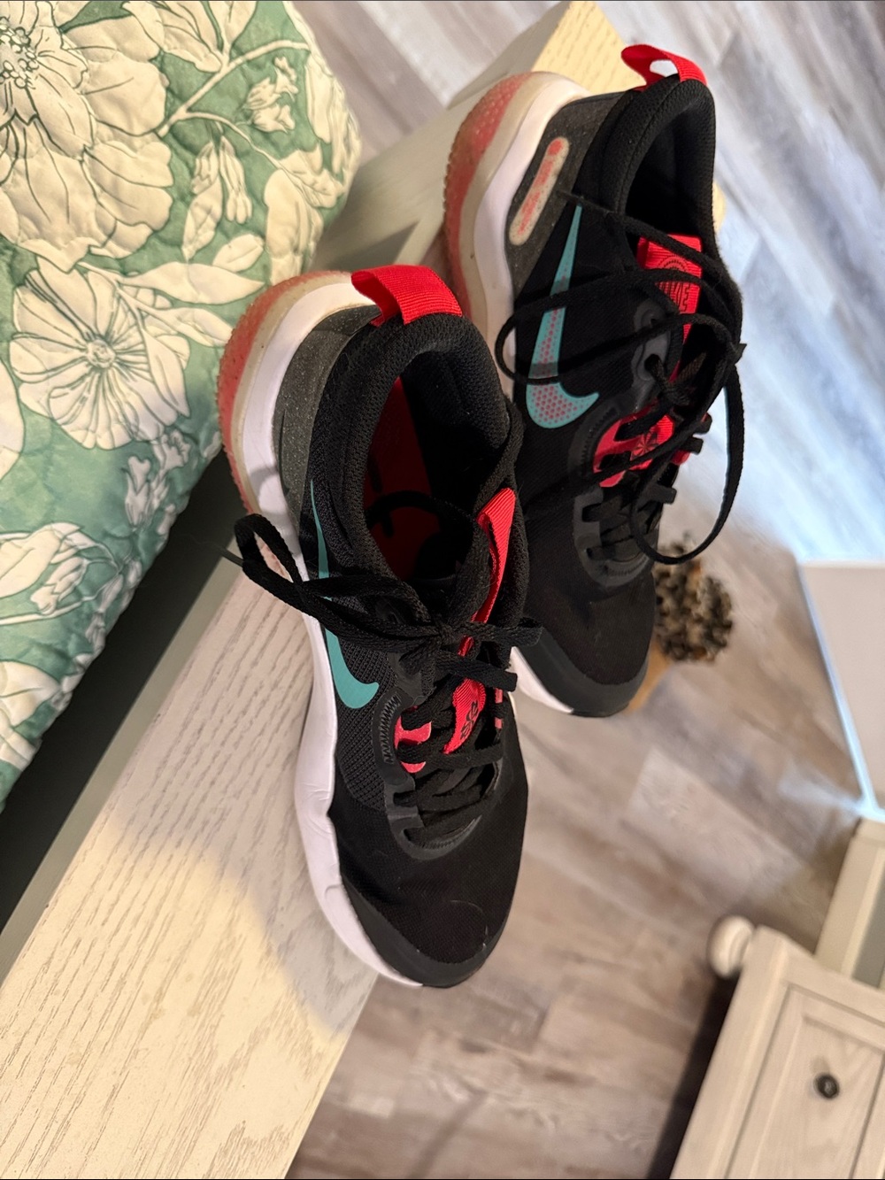 Nike Kids Black Sneakers with Teal Swoosh and Red Accents